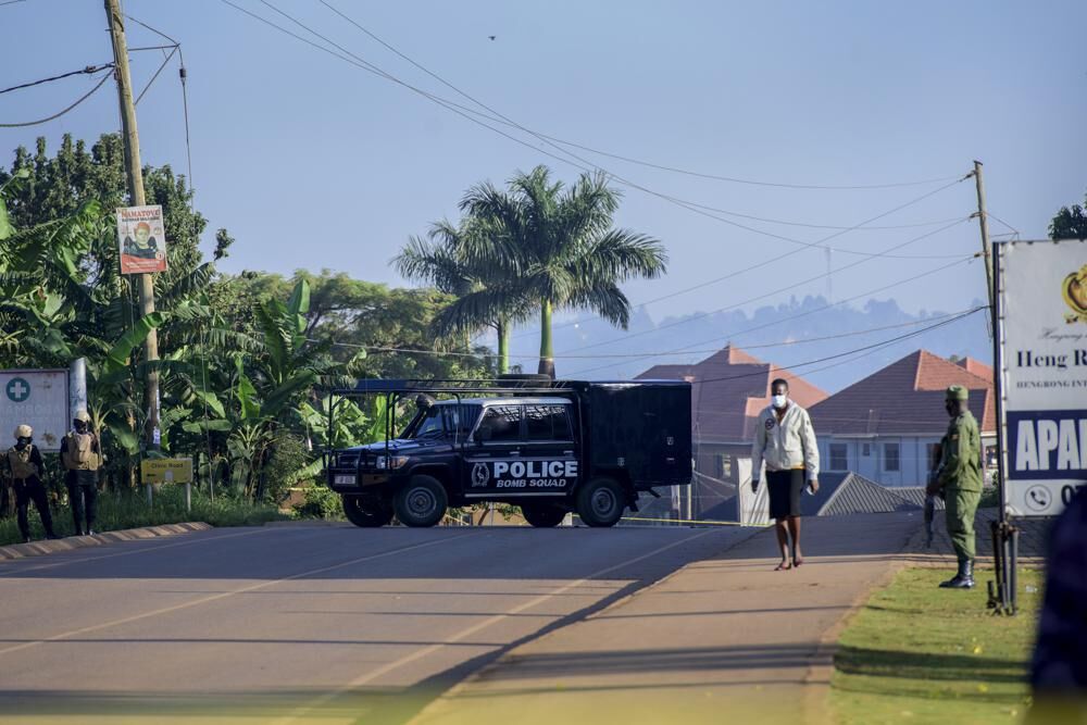 Police vehicles after bombing in Uganda